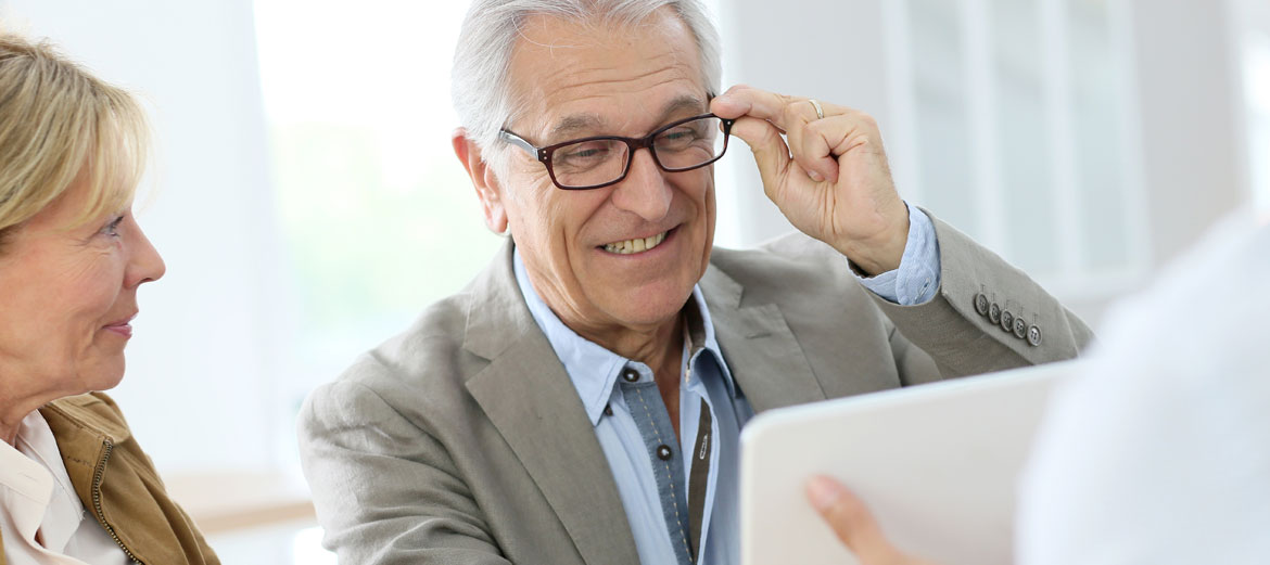 man trying on eyeglasses